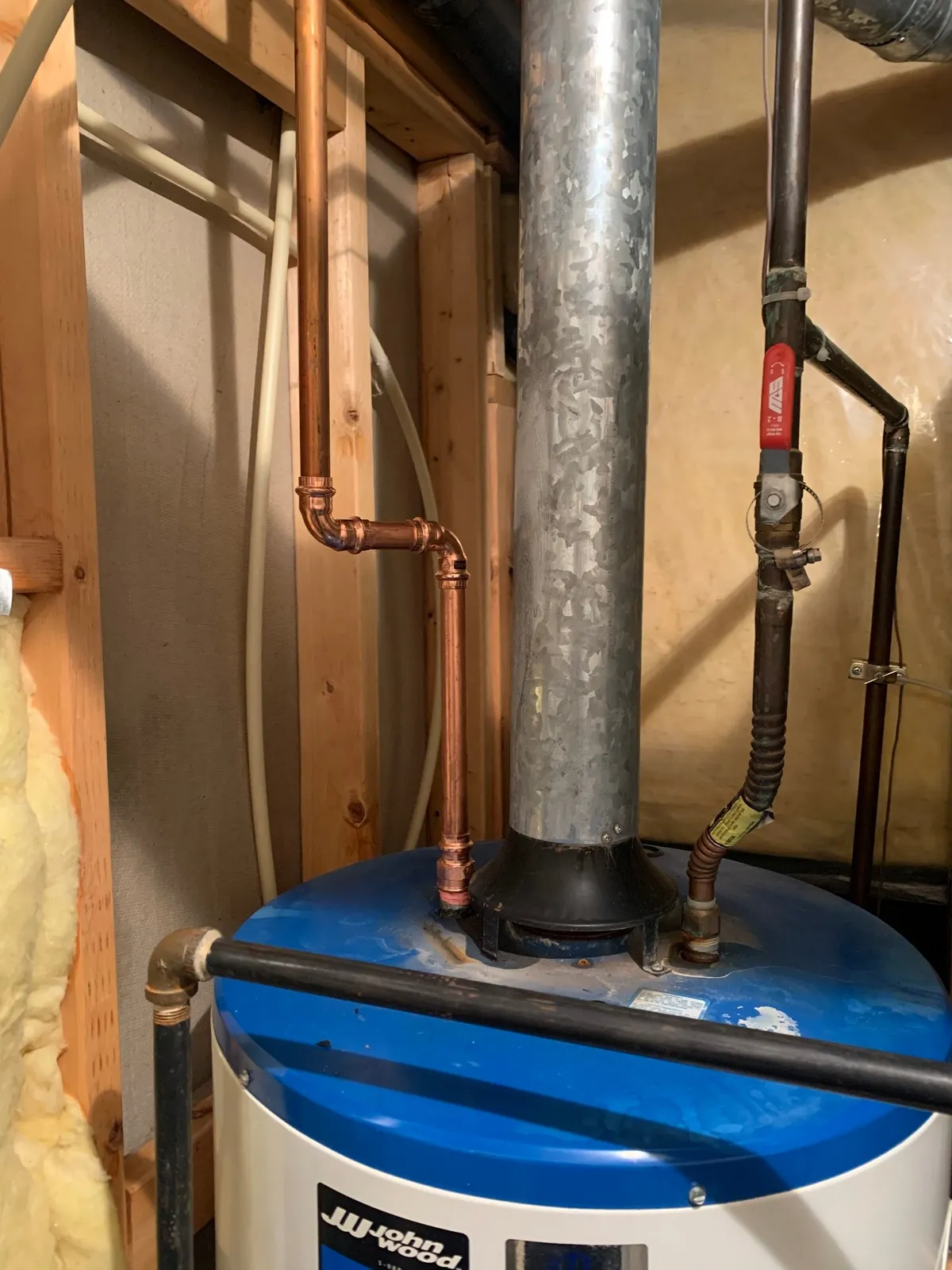 Freshly repaired water heater by Mr. Rooter Plumbing in St. Albert home