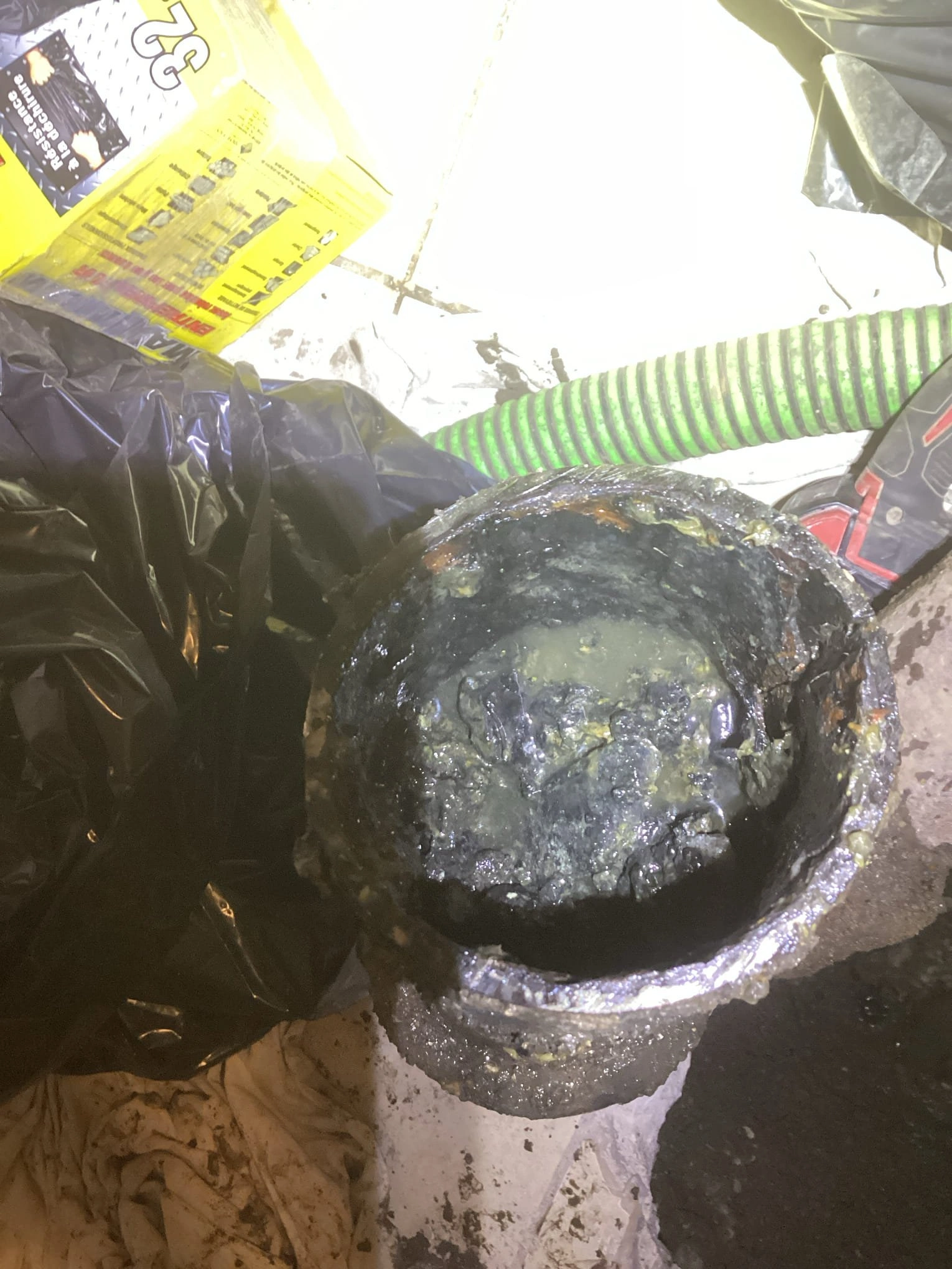 removing the clogged pipe.