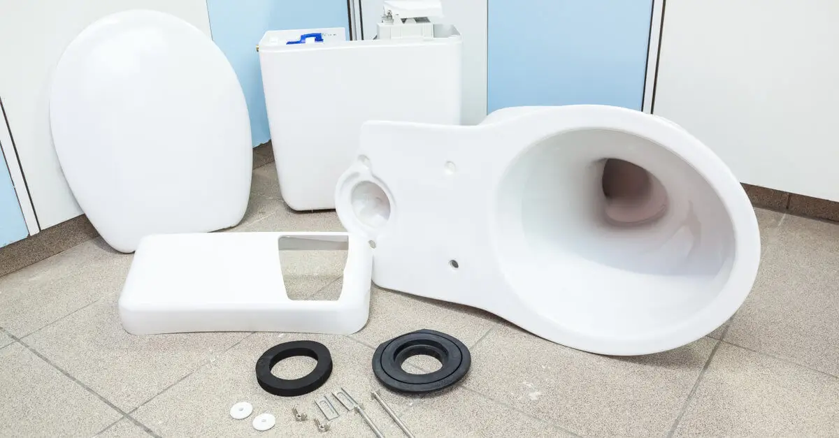 The individual components of a toilet set out for a new Mississauga toilet install.