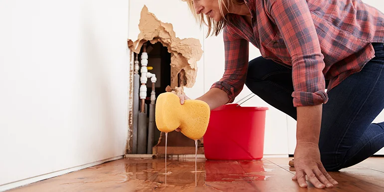 women sponge washing floor