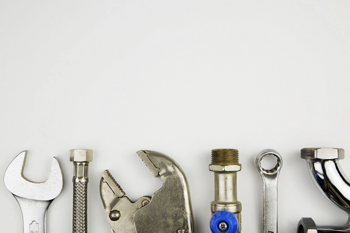 Set of tools commonly used by plumbers during water heater installations in Brampton