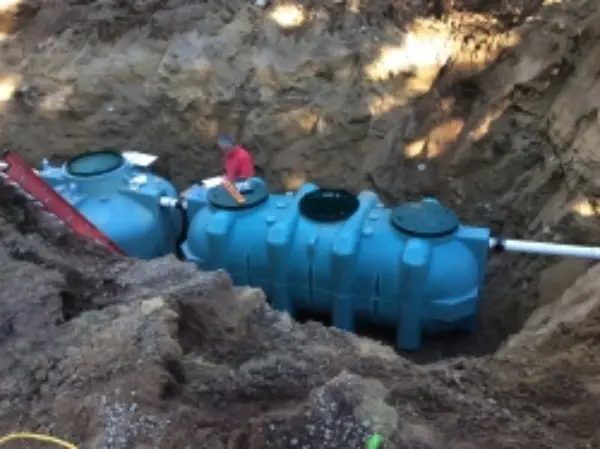 septic tank in ditch