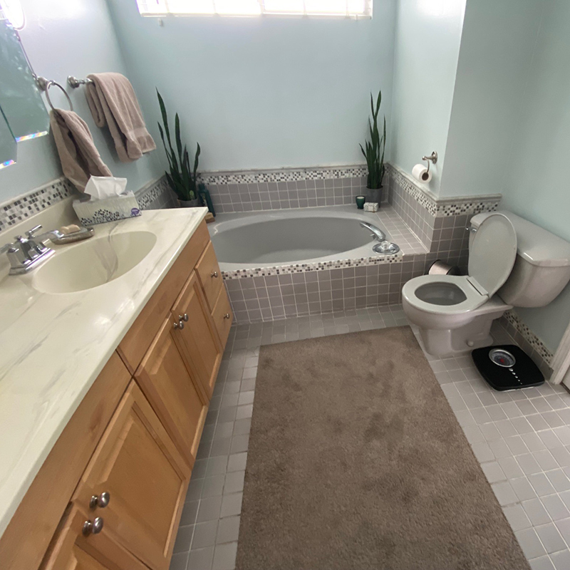 full bathroom with since, toilet, and built in tub